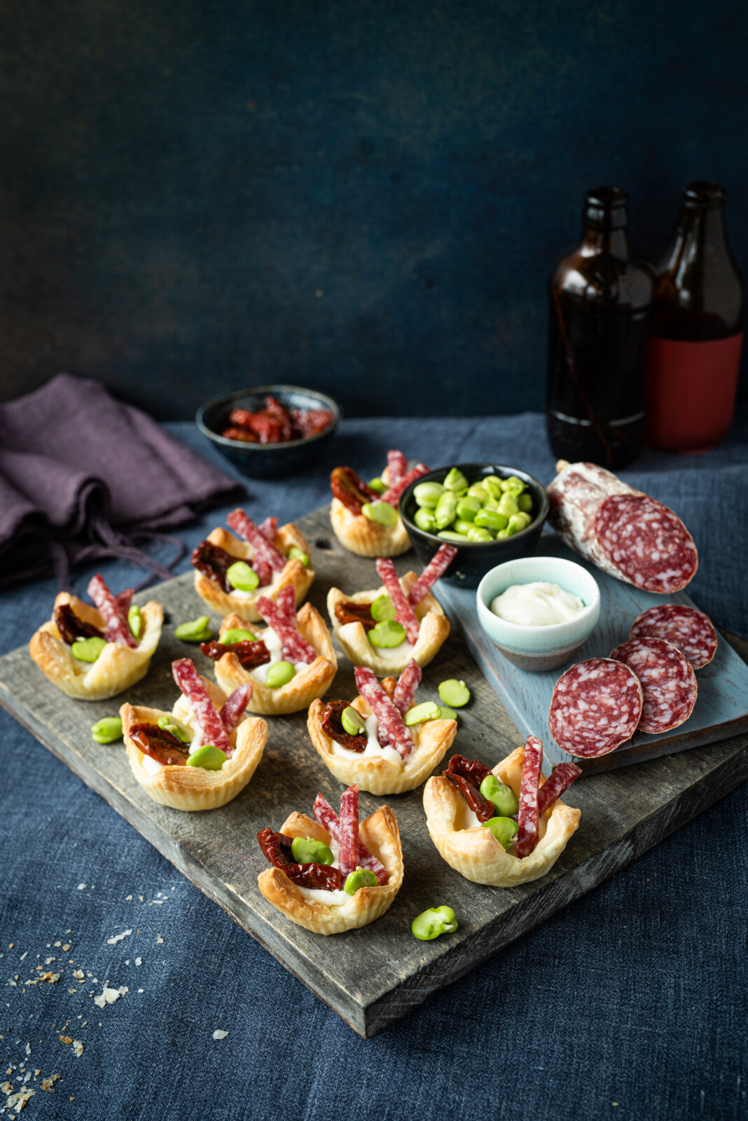 Cestini di sfoglia integrale, con Salamini Italiani alla Cacciatora DOP, crema al Grana Padano DOP